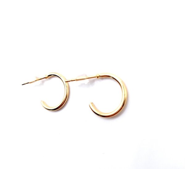 Goudkleurige  oorbellen ringen - mini ( Ø +/- 0,9cm )
